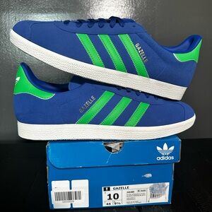 New Adidas Gazelle Men’s size 10 Women’s 11. Royal Blue with Green Stripes.
